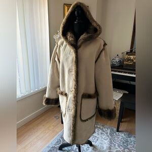 Faux suede and reversible knee length car coat. Dennis Basso size S.